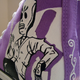 Illustration for article titled Grim Fandango Shoes Make Purple Sneakers Possible